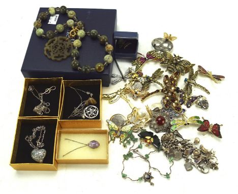 A large selection of silver and costume jewellery, including a jade necklace, brooches modelled as insects, silver pendants a