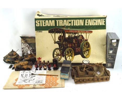A Garrett 1919 Steam Traction Engine kit, in the original box, together with a selection of military vehicle models and acces