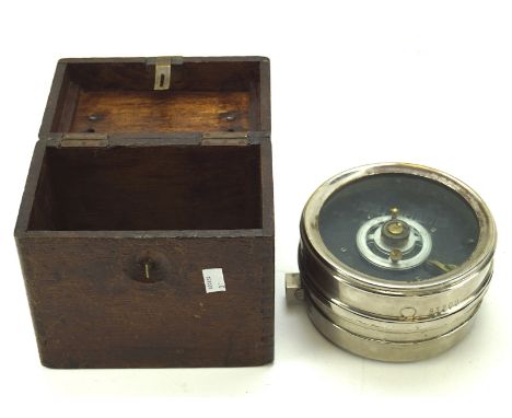 A vintage pigeon clocker, within a wooden box with handle to the top, height 20cm