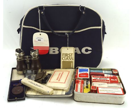 An assortment of mixed collectables including a BOAC first class flight bag, 1966 metal cased first aid kit (complete), and a