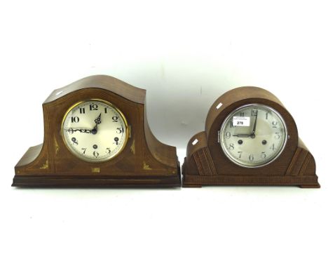 Two 20th century mantle clock, one being oak cased with Art deco motifs, each dial with Arabic numerals denoting hours, large