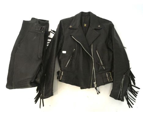 A vintage leather biker jacket and trousers, the jacket with dragon emblem to inside liner, the trousers by Scott leather