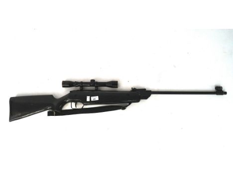 A vintage 5.5/.22 air rifle with Nikko Stirling scope 4x32, made in Germany length 115cm Condition Report: Exterior repainted