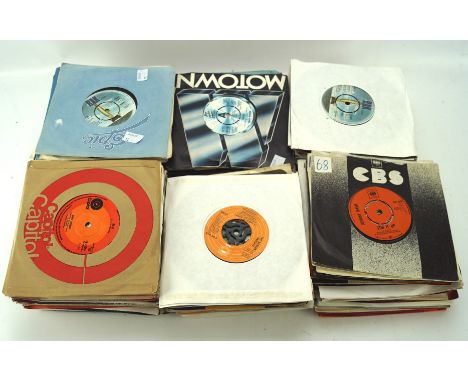 A large quantity of vintage vinyl singles, including Hot Chocolate, Billy Connolly and more