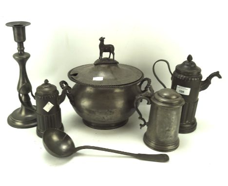 A collection of pewter wares, to include a lidded tureen with serving ladle, lidded tankard and more, the tureen measuring 28