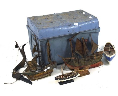 A vintage blue painted metal storage box containing a selection of model ships, the box measuring 42cm x 60cm x 43cm