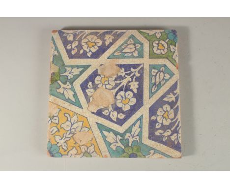 A FINE 18TH-19TH CENTURY INDIAN MULTAN TILE, with geometric designs, 23cm x 23cm.