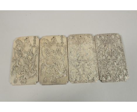 FOUR CHINESE WHITE METAL SCROLL WEIGHTS, each with stamped mark to reverse, (4).