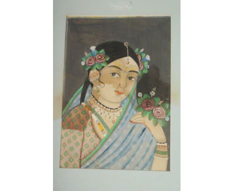 A FINE INDIAN PAINTING OF A FEMALE PORTRAIT, 31cm x 21cm.