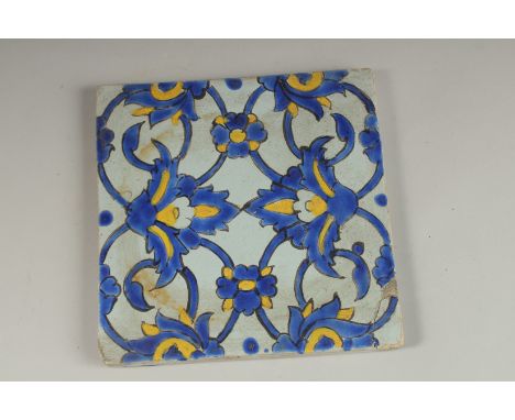 A FINE 18TH-19TH CENTURY PERSIAN GLAZED POTTERY TILE, 20cm square.