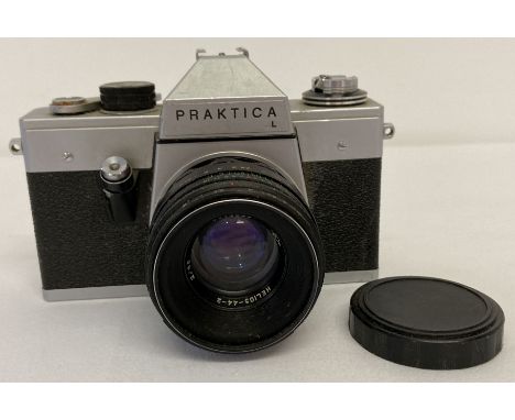 A vintage German Practika L Pentacon M42 camera with Helios-44-2 lens and cap.  From a private collection.