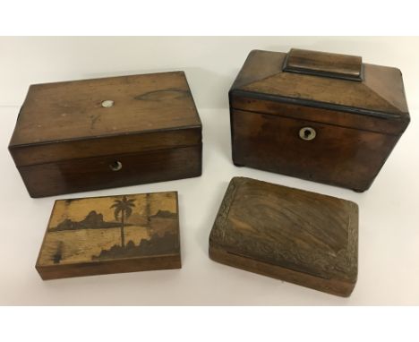 4 antique and vintage wooden boxes. In varying sizes and conditions. Comprising: a sarcophagus shaped tea caddy, a small jewe