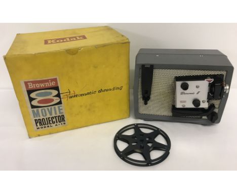 A boxed vintage Kodak Brownie 8 movie projector, model A-15. In excellent condition, complete with box interior packaging. 