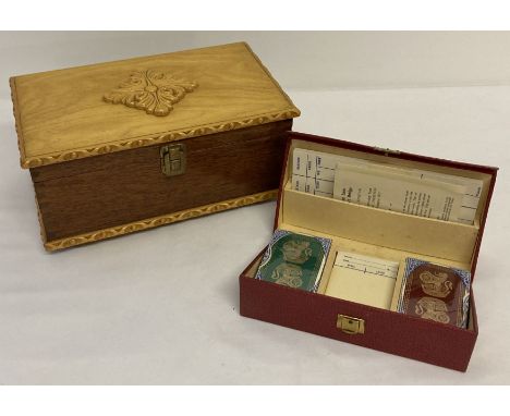 A 1950's boxed bridge set with 2 unopened packs of cards, together with a vintage wooden box. Bridge set complete with instru