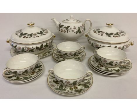 A collection of assorted first quality Wedgwood dinner and tea ware in "Strawberry Hill" pattern. Comprising: 2 lidded tureen