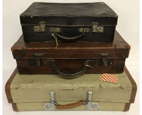 3 vintage suitcases to include leather. A vintage ladies "The Nytee" suitcase with floral lining, a beige and tan suitcase wi