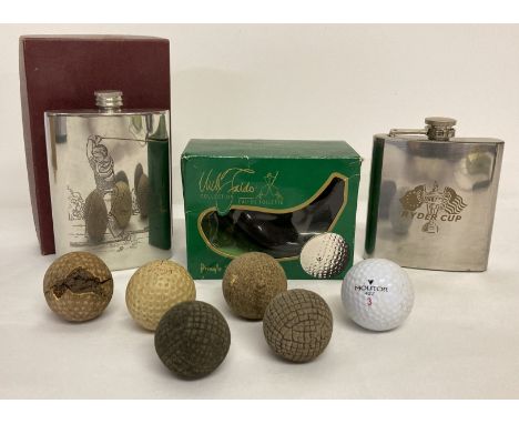 A small collection of golf related items. Comprising: a Ryder Cup hip flask, a hip flask engraved with a golfer, a boxed bott