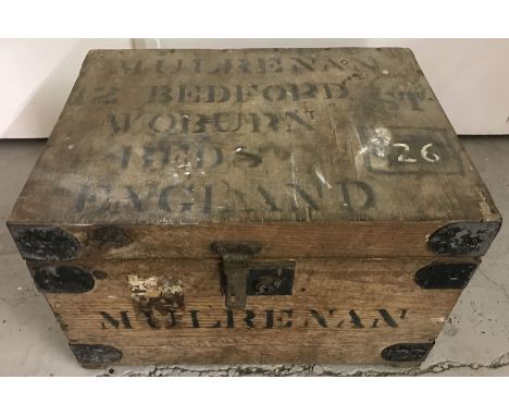 A vintage pine black metal banded tool box with interior lidded compartment. Complete with a collection of vintage tools to i