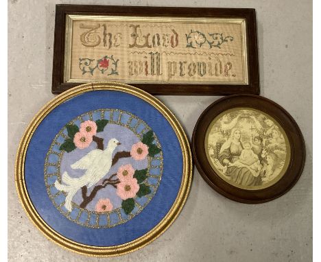 A framed and glazed vintage embroidered panel. Together with a framed and glazed tapestry with bead work and a framed and gla