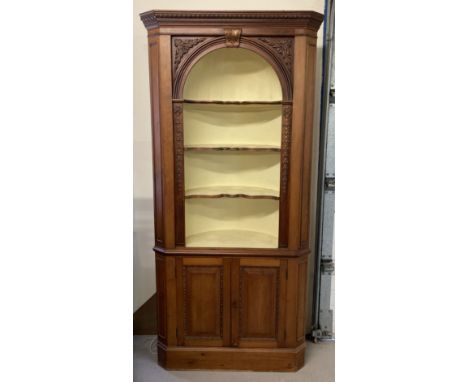 A large mid century Victorian style corner hall cupboard. Double door cupboard (complete with key), shaped shelf fronts, carv