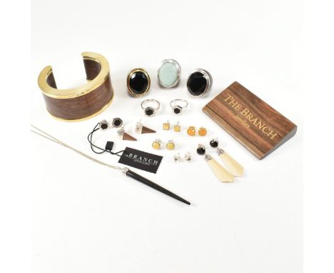 A collection of contemporary designer jewellery by 'The Branch jewellery'. The lot to include three gem set wood silver mount