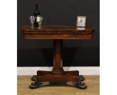 A William IV rosewood card table, hinged top enclosing a baize lined playing surface, spreading hexagonal column, moulded soc