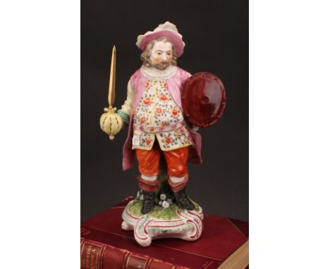 A large Derby patch mark figure, Quinn as Sir John Falstaff, he stands holding an oval shield, wearing a broad brimmed hat, a