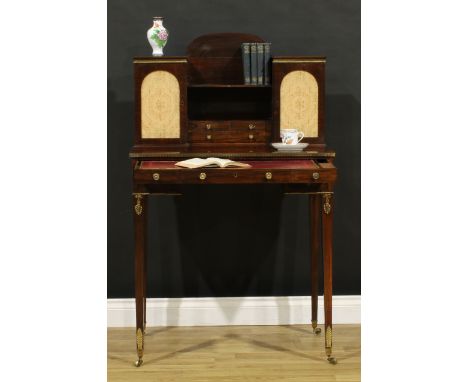 A late 19th century French Empire design gilt metal mounted rosewood bonheur du jour, shaped superstructure with central shel