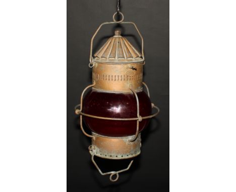 A Davy &amp; Co London Ltd. ship's cabin oil lantern, the hinged conical cover enclosing a later lamp socket, pierced collar,