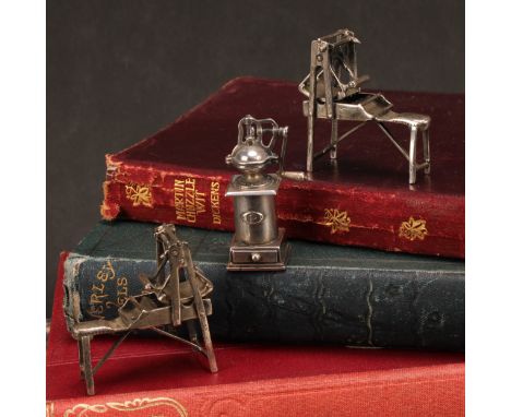 Silver Toys - a novelty miniature model of a pepper grinder, 4.5cm high, marked 800; a pair of agricultural implements, 4cm l