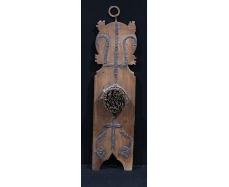 A 19th century wall-hanging flax hackle, applied with wrought metal mounts as a trident, cross, reptiles and shields, 100cm h