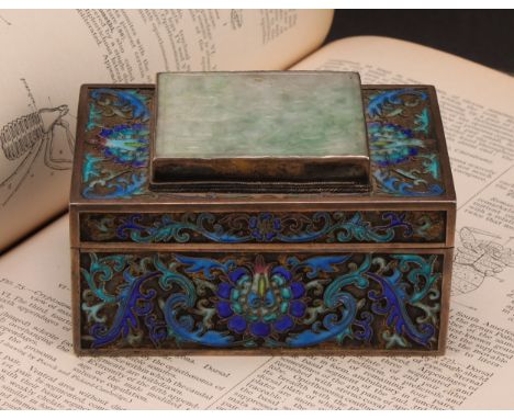 A Chinese silver and enamel rectangular box, removable cover applied with a jade coloured hardstone tablet, carved with a tre