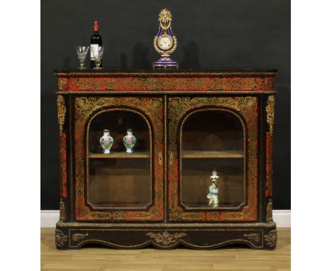 A Louis XV Revival gilt metal mounted, ebonised and premier and contra-partie brass marquetry pier cabinet, in the manner of 