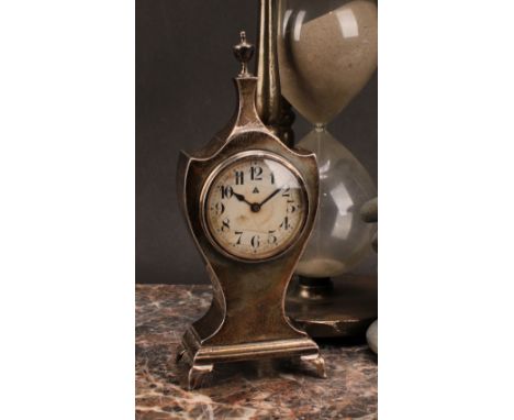 A George V silver vasular mantel timepiece, in the Neo-Classical taste, 5cm clock dial inscribed with Arabic numerals, keyles