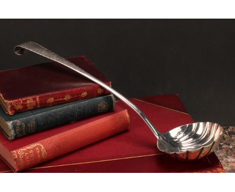 A George III Irish silver Old English pattern soup ladle, shell bowl, curved terminal, 35cm long, Alexander Richards, Dublin 