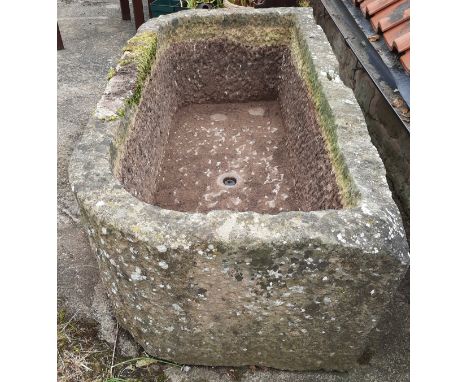 A large gritstone garden trough, 49cm high, 137cm wide, 68cm deepNB this lot remains in situ near Worksop. It is the responsi