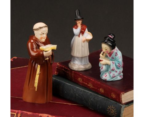 A Royal Worcester candle snuffer, Japanese Geisha, painted in polychrome, wearing in a light blue kimono, 7cm high, crown and