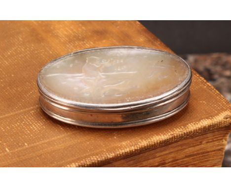 A George I silver and mother of pearl oval snuff box, stand-away hinged cover carved with a hunting scene, 6.5cm wide, unmark