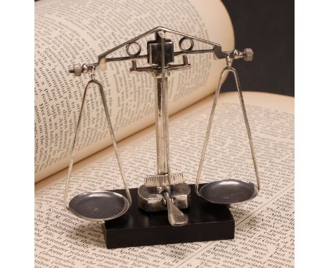 A set of Continental silver toy novelty miniature balance scales, rectangular marble base, 8.5cm high 