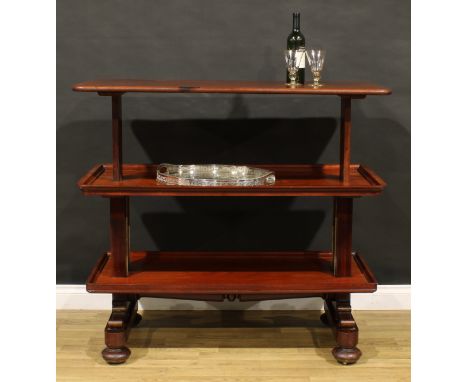 A William IV mahogany metamorphic buffet serving table, rounded rectangular top above two further plateaux, rectangular suppo