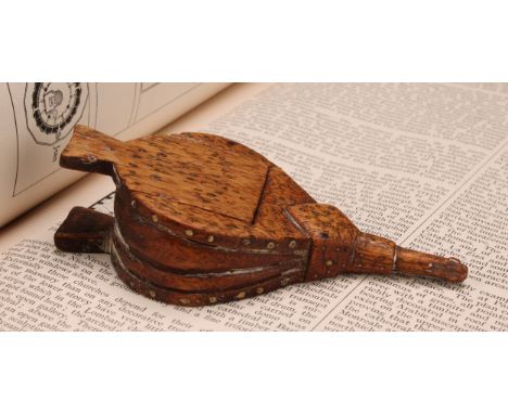 A 19th century novelty treen snuff box, as bellows, decorated with brass pin work, sliding cover, 11cm long 