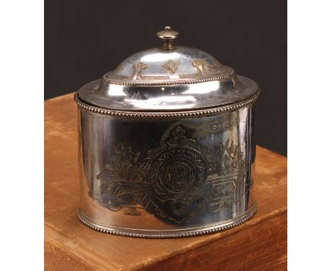 A Victorian E.P.N.S oval tea caddy, bright-cut engraved with strapwork, leaves and flowers, hinged domed cover, beaded border
