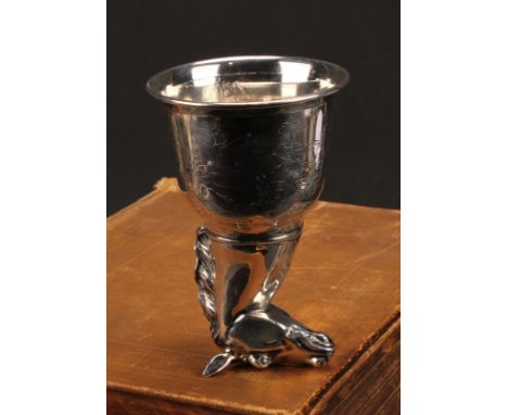 A German silver novelty stirrup cup, as a horse's head, the ogee bowl engraved with a hunting scene, 15cm high, import mark f