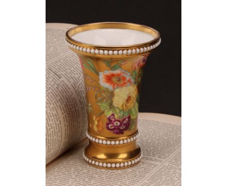 A Spode trumpet shaped vase, painted with flowers and ripe fruit on a gilt ground, 11.5cm high, pattern number 711, painted m