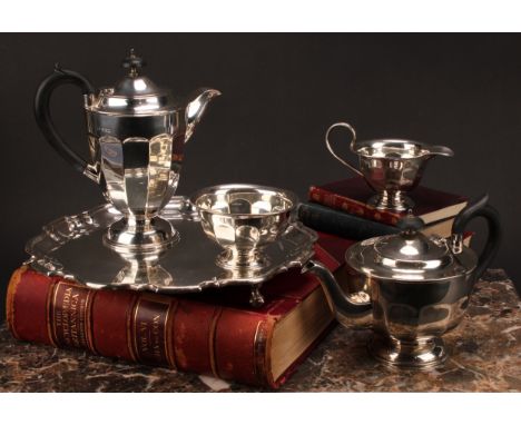 A composed silver four piece tea service, Edward Viner, Sheffield 1930/1938; a silver shaped circular tray, acanthus-wrapped 