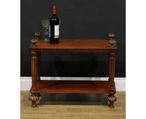 A Victorian mahogany two-tier table-top buffet or dumb waiter, rounded rectangular plateaux with moulded edge, 55cm high, the