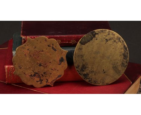 A Chinese bronze lotus shaped hand mirror, 10cm wide; another (2) 