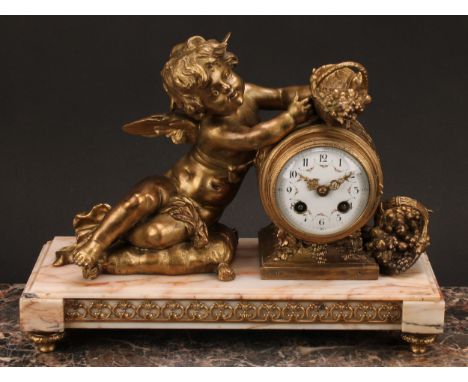 An early 20th century French gilt spelter mounted marble mantel clock, 8.5cm enamel dial inscribed with Arabic numerals, the 