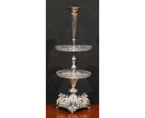 A Victorian electro-plated table centrepiece, trumpet shaped epergne flute above two glass plateaux etched with fruiting oak,