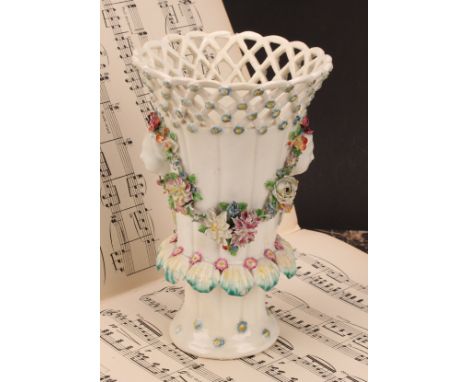 A Derby patch mark frill vase, lattice rim flowerhead diapers, applied with masks and flower encrusted swags, 18cm high, c.17